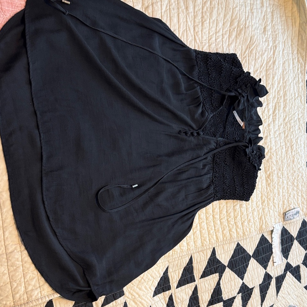 Black Sleeveless Blouse with Detail